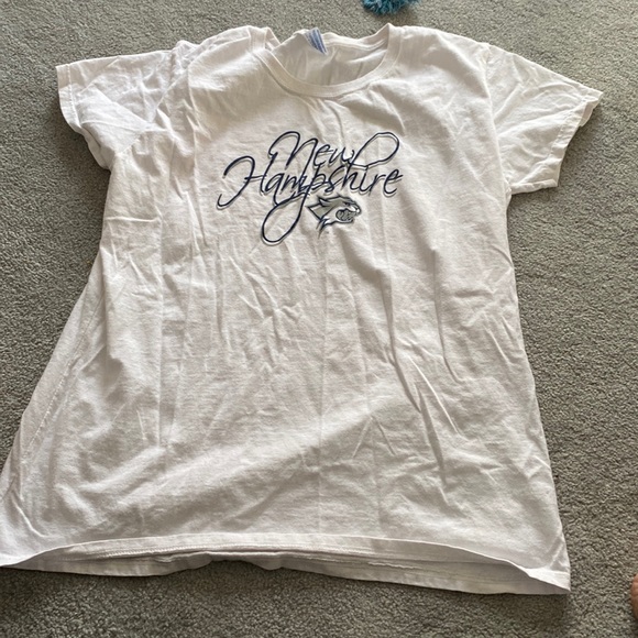 Two New Hampshire shirts, white s/s x/l with UNH logo, the other is l/s purple L - Picture 1 of 6